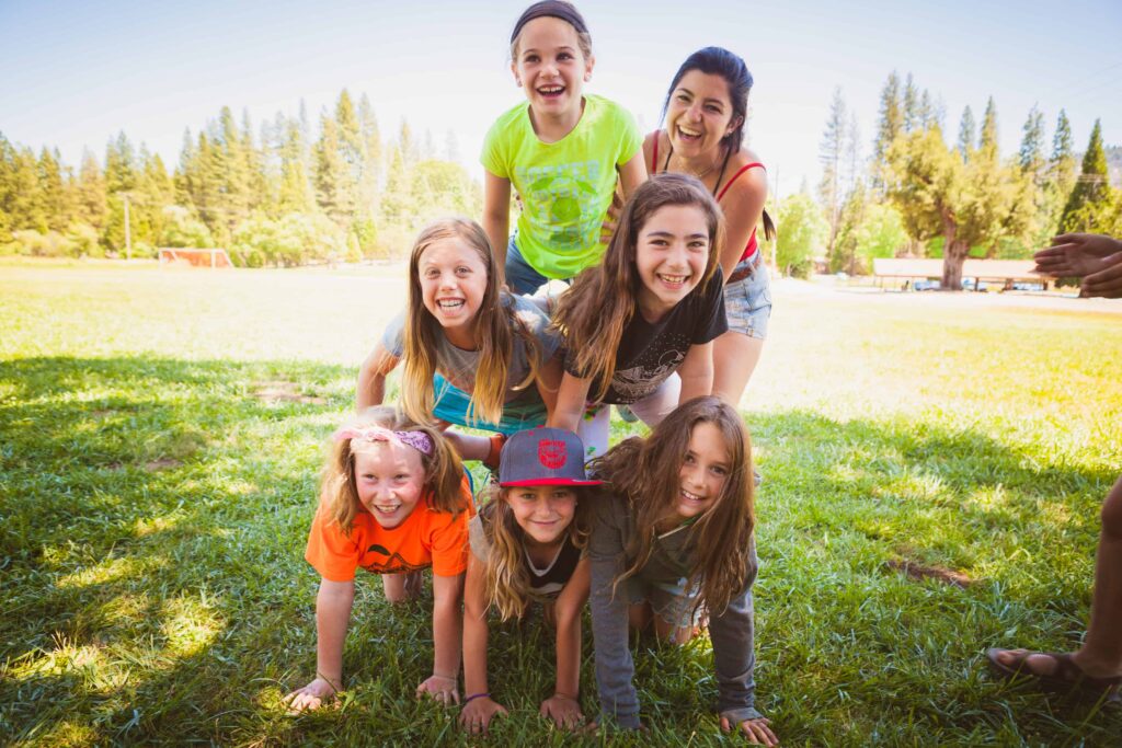 Campers doing a human pyramid